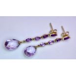 A Pair of 9K Yellow Gold Amethyst Drop Earrings. 4cm drop. 2.22g total weight.