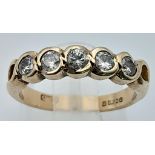 9K YELLOW GOLD, DIAMOND 5 STONE RING. 0.25CTW, WEIGHS 2.4G AND SIZE K. REF: SC 7073