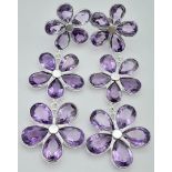 A pair of Amethyst, Flower Design, Sterling Silver drop earrings. Measuring 5.5cm in length and