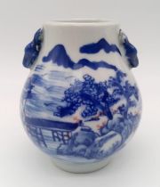 A very fine 18th Century Blue & White Vase depicting rural scenes. Marked on base.