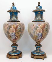 Pair of Large Sèvres Floor Porcelain Urns. Late 19th Century, this pair is the epitome of class,