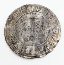 A Henry VII Silver Hammered Profile Groat Coin. Please see photos for conditions.