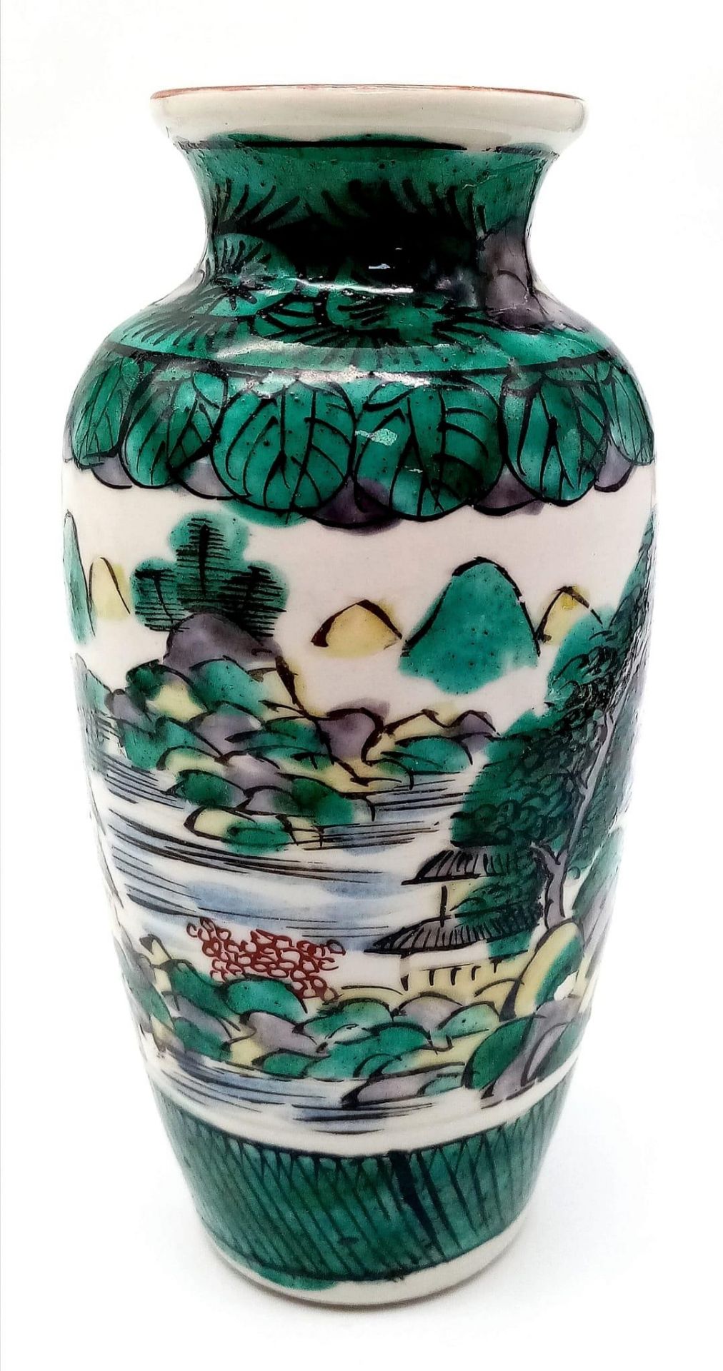 A Japanese Vase, depicting rocky lakeside scenery with mountain ranges in distance. Beautiful,