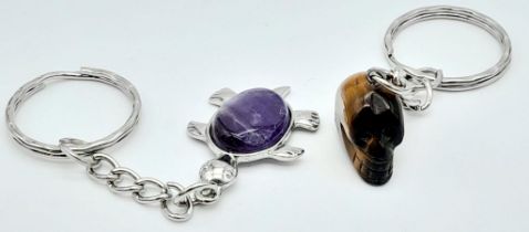 Two Gemstone Keyrings - A Tigers Eye Skull - 7cm and an Amethyst Turtle - 9cm.