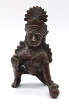 An 18th, early 19th, Century bronze South East Asian Figure. Very unusual, deity in a gesturing