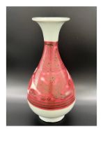 A red under-glazed Yuhuchun vase, Yuan dynasty. In 1955, a red under-glazed flower pattern jar