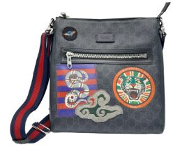 Gucci Night Courier Crossbody Bag. Classic GG canvas, patch detail, logo patch to the front, front