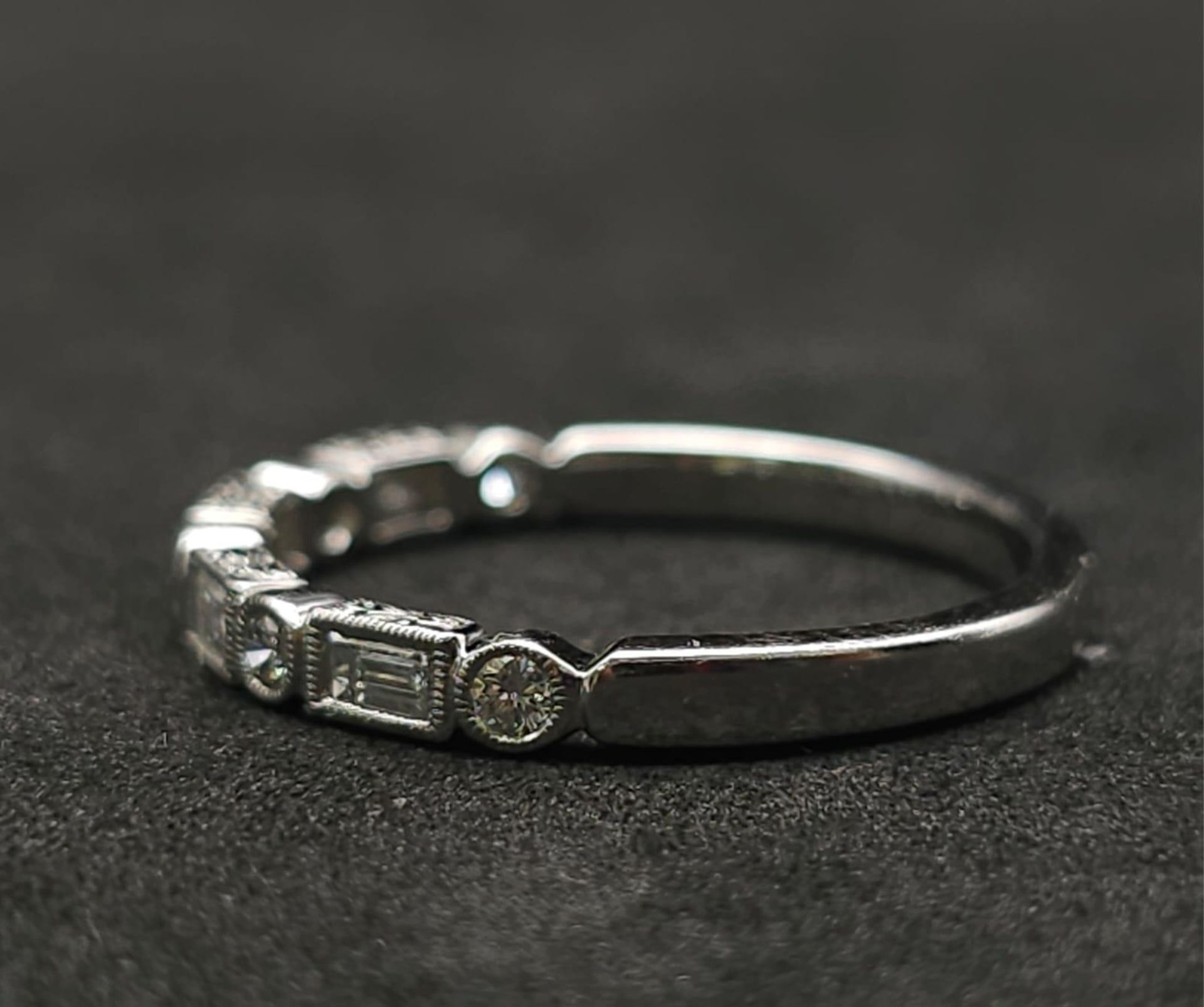 A 9K White Gold and Diamond Half Eternity Ring. Size N. 2g total weight. - Bild 5 aus 7