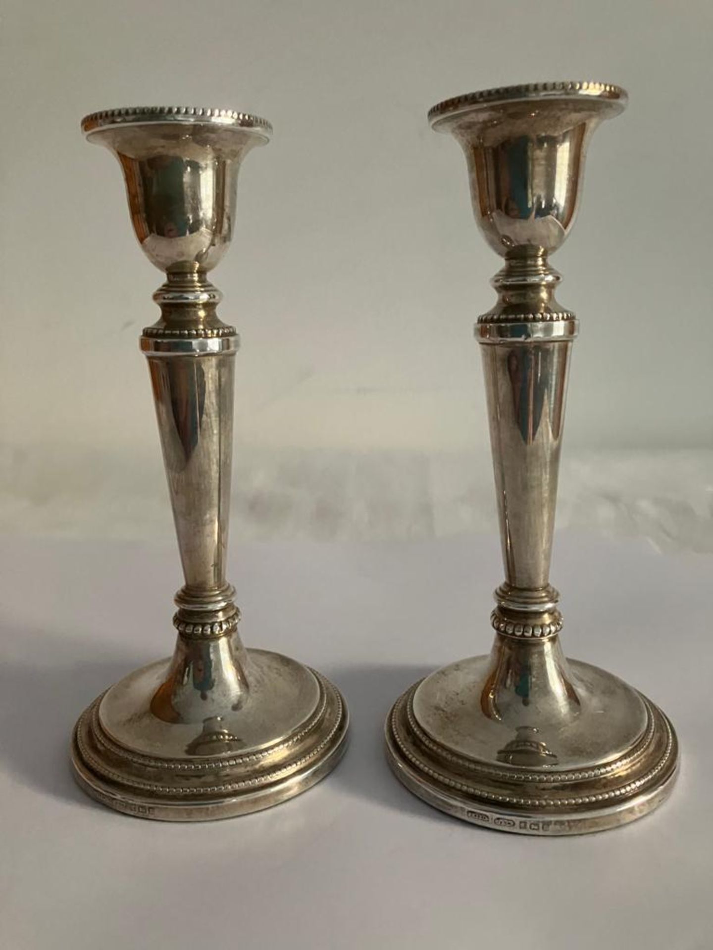 A handsome pair of vintage SILVER CANDLESTICKS. Attractive tapered form standing 14 cm high.