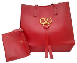 A luxurious Valentino Garavani Red Leather Tote Bag. Quality soft leather with ample space inside.