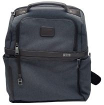 Charcoal Tumi Designer Backpack. Known for their high standards of quality, this back doesn't fail