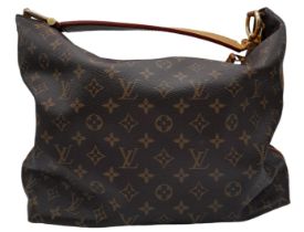 Louis Vuitton Sully Bag. Famed LV Monogrammed canvas exterior, thick tanned leather handle and