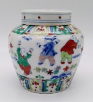 20th Century Chinese Ginger Jar with lid. Vibrantly decorated with people playing games, dancing and
