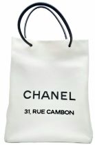 Chanel 31 Rue Cambon White Leather Tote Bag. Super soft quality leather exterior with a wonderful