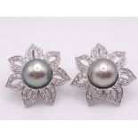 A MAGNIFICENT PAIR OF 14K WHITE GOLD DIAMOND & TAHITIAN PEARL EARRINGS, APPROX 0.90CT DIAMONDS AND