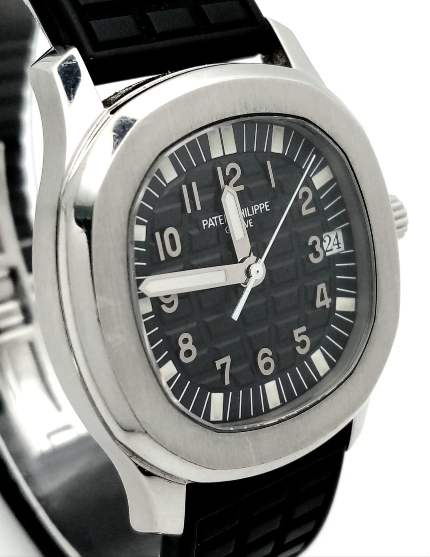A Patek Phillippe Aquanaut Watch. Textured black rubber strap. Stainless steel case - 36mm. - Image 3 of 8