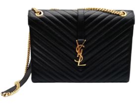 The Saint Laurent YSL Large Envelope Chain Flap Bag is a sophisticated choice in black Grain de
