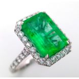 A 6.19ct Rare Transparent Green Rectangular Cut Natural Colombian Emerald and Diamond Ring.