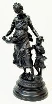 Charming, large statue depicting a Mother and a Daughter out collecting flowers. Standing 54cm tall,