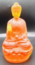 Beautiful Buddha Statue. Standing 14cm tall, this orange figurine of Buddha will bring some peace
