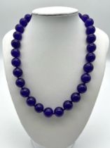 A Hypnotising Deep Purple Large Jade Beaded Necklace. 42cm necklace length. 12mm beads.