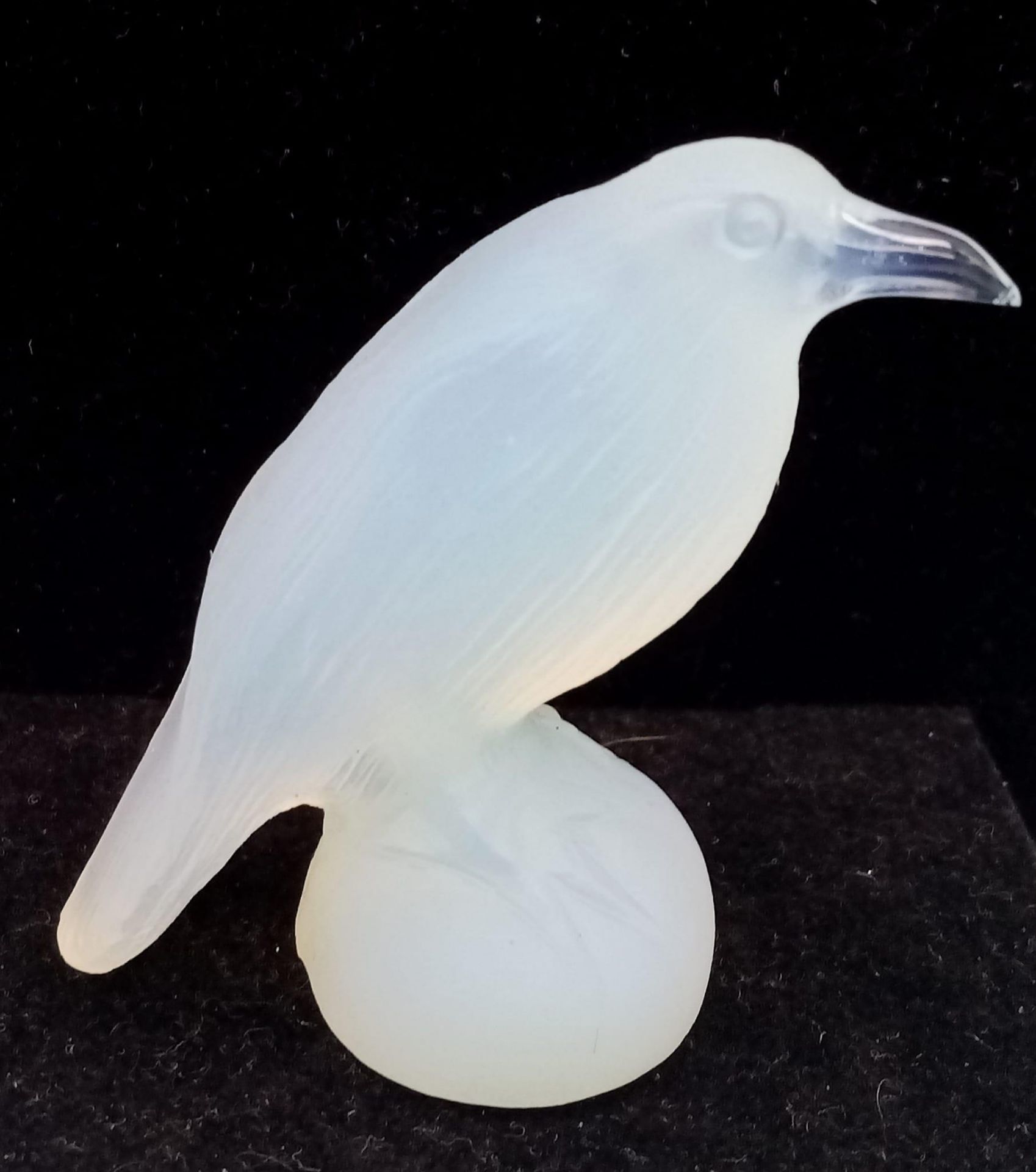 A Polished Opalite Raven Bird Figure. Perfect curiosity for light colour-play. 6cm tall.