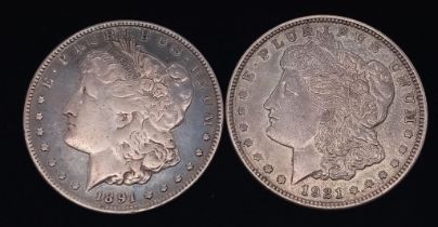 Two, USA One Dollar Coins. Including a 1891(s) and a 1921(d). See photos for condition.