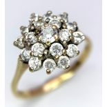 A 9K Yellow Gold CZ Floral Cluster Ring. Size P. 2.68g total weight.