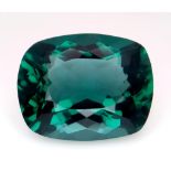 A 14ct Rectangular Cut Apatite Gemstone. Well faceted with a trillion base. No visible marks or