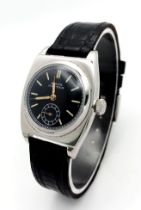 A VINTAGE ROLEX OYSTER RARE MANUAL WIND (ALSO KNOWN AS THE ROLEX "VICEROY") ON A BLACK LEARHER STRAP