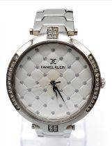 A Daniel Klein 'Pillow Talk' Ladies Watch. Stainless steel bracelet and case - 36mm. White quilted