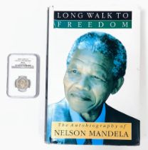 A PERSONALLY SIGNED COPY OF HIS AUTOBIOGRAPHY CALLED "LONG WALK TO FREEDOM" BY NELSON MANDELA PLUS A