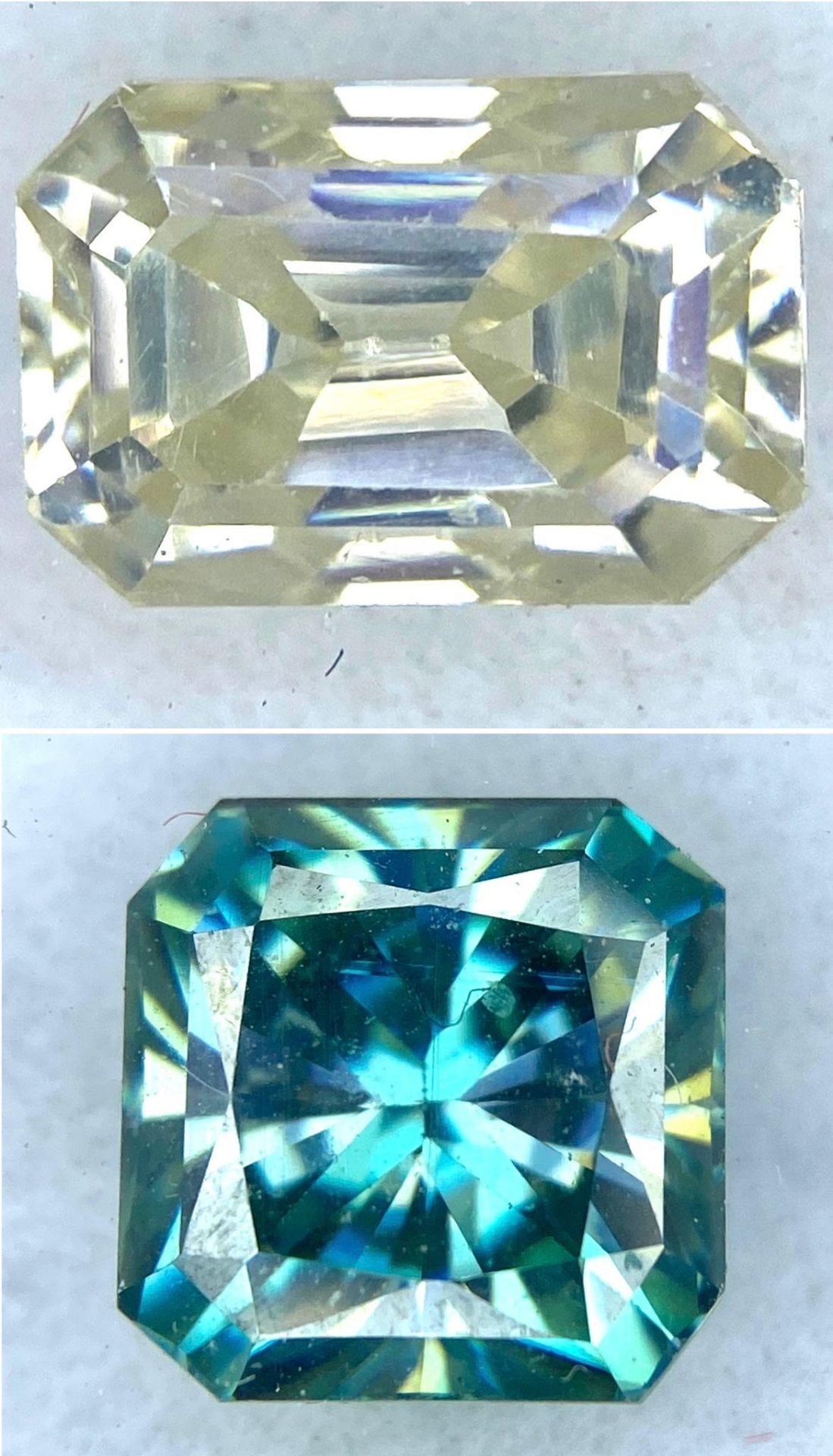 A Collection of 2 Moissanites Gemstones - 3.60ct blue and 2.840ct White Moissanite. Both with GLI