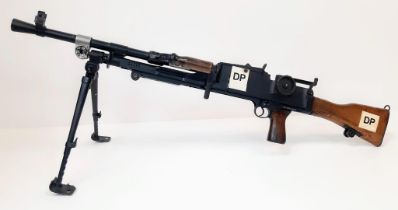 A DEACTIVATED BREN GUN WITH INTEGRAL SPRING LOADED SUPPORT FEET . THIS ACTUAL GUN WAS USED FOR