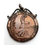 An Antique 1st prize sterling silver medal dated 1928 in the beer competition awarded to T.Losco