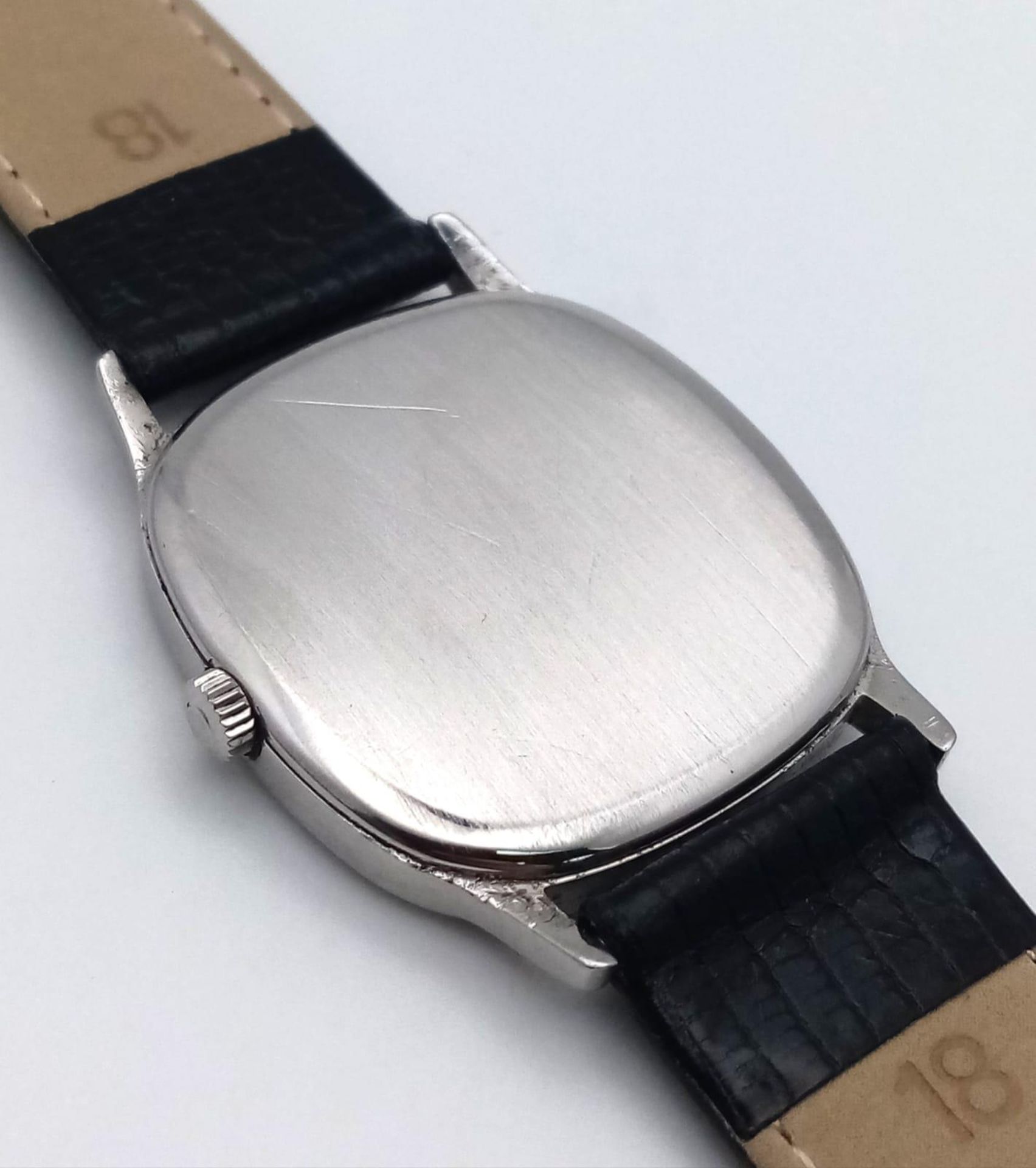 AN OMEGA DE VILLE IN STAINLESS STEEL WITH MANUAL WINDING MOVEMENT AND ON A BLACK LEATHER STRAP . - Image 6 of 6