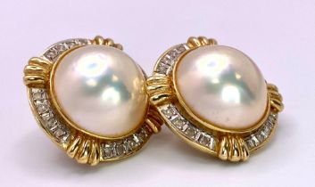 A Pair of Very Attractive 14K Yellow Gold, Pearl and Diamond Earrings. Two South Sea Pearl Cabochons