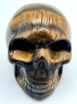 A Hand-Carved Tigers Eye Skull Figure. Curiosity or small paperweight. 5cm x 4cm.