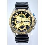 A Futuristic Casio Chronometer Gents Watch. Black rubber strap. Two tone stainless steel case -