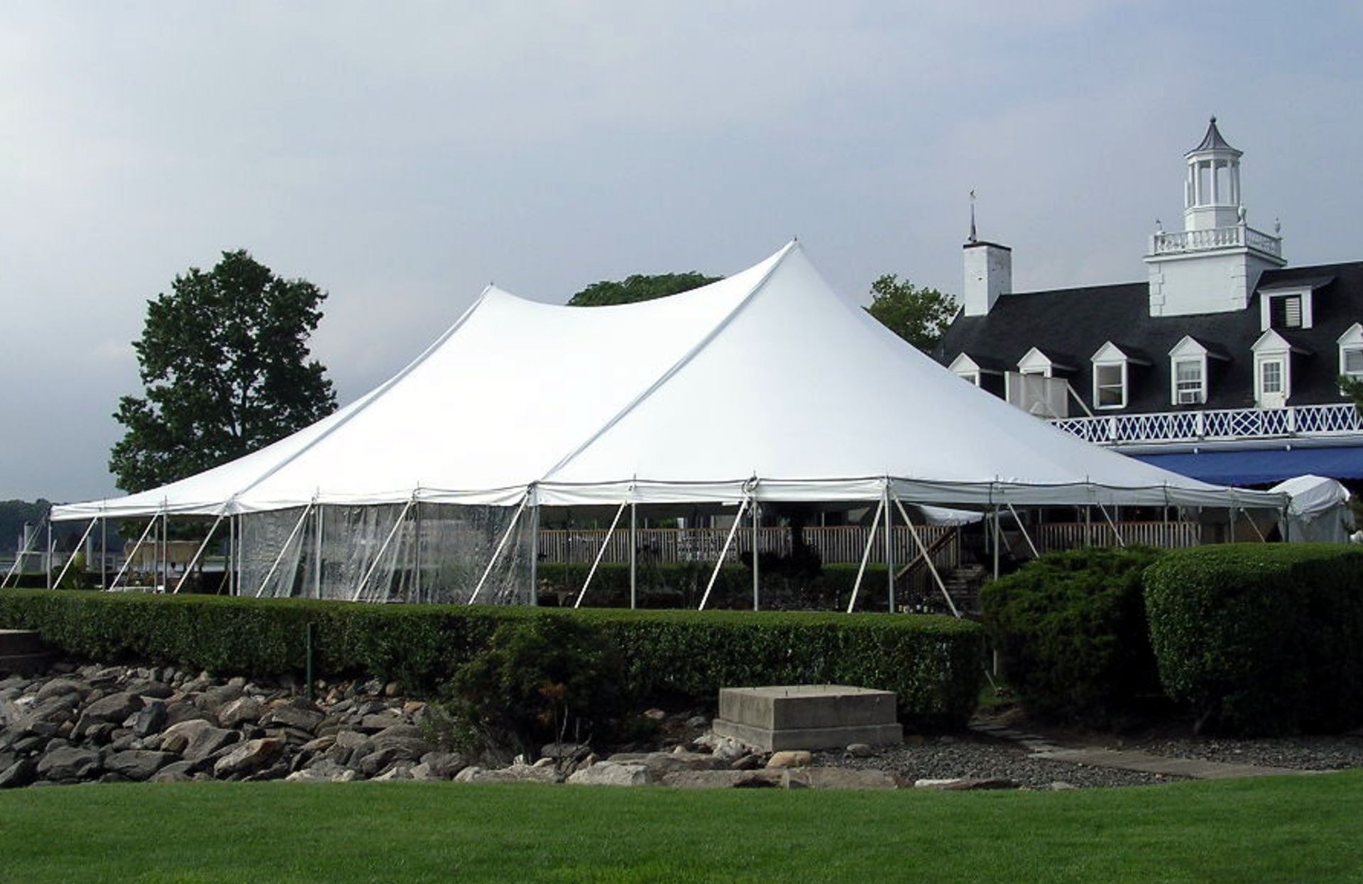 50x120 White Genesis High Peak Pole Tent, Top Only. Grade B. 2-25' ends, 1-30' mid, 2-20' mids