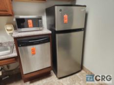 Whirlpool refrigerator, Frigidaire dishwasher and Panasonic microwave oven