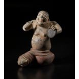 Arte Cinese A rare and fine figure of a cymbal playerChina, Tang dynasty, 12th century.