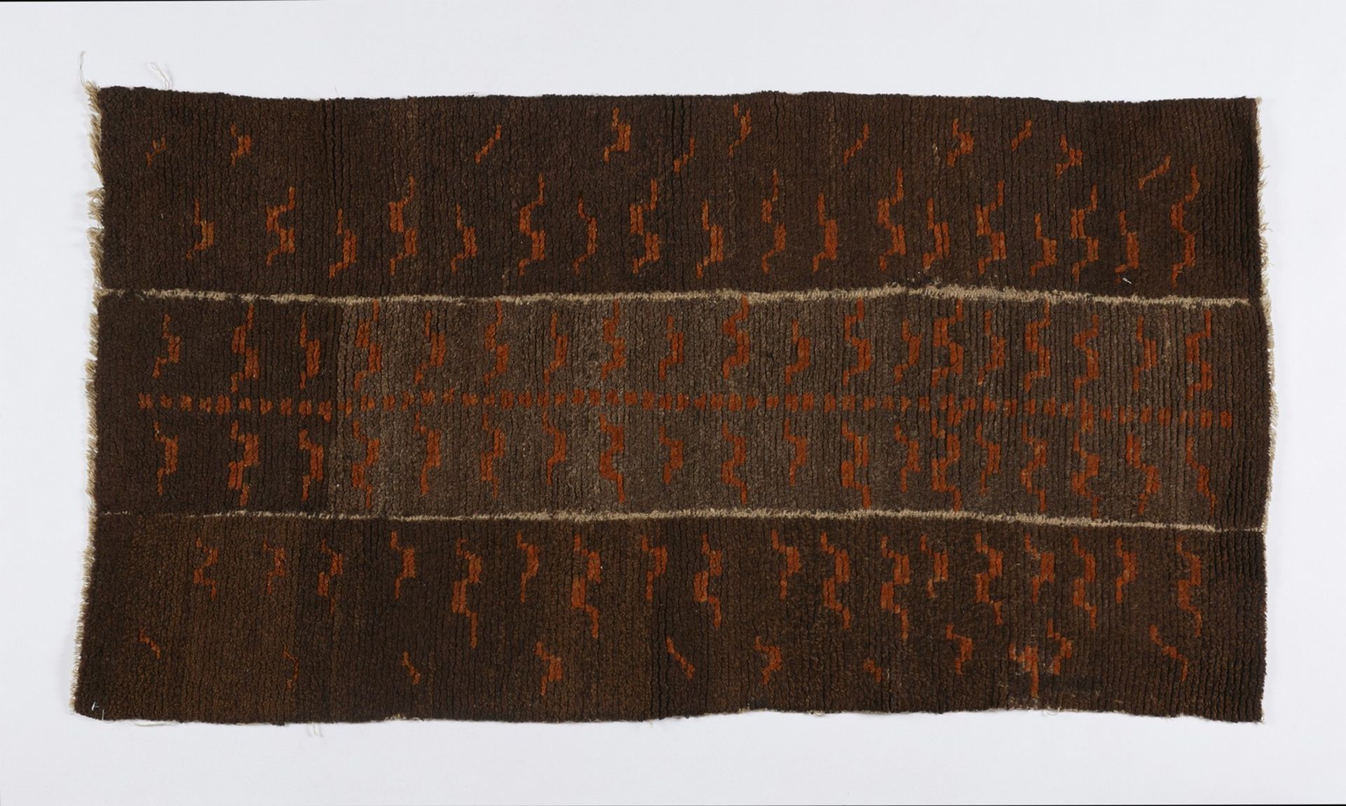 Arte Himalayana  A Tsukdruk rug with tiger skin pattern Tibet, late 19th century .