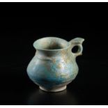 Arte Islamica A fritware turquoise glazed jug Iran, 12th-13th century .