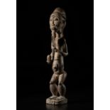 Arte africana Ivory Coast, Baule. Parallel world figure Blolo Bla. Wood with traces of offerings. F