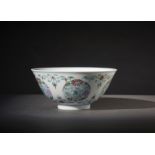 A doucai porcelain cup. Cina, Qing dynasty, 19th century A porcelain cup with elegant doucai