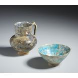 Pottery glazed bowl and jug Iran, 12th -13th century Frit body; one with a high cylindrical neck and