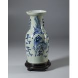 A blue and white pocelain baluster vase painted with pho dog China, late 19th century Cm 20,00 x