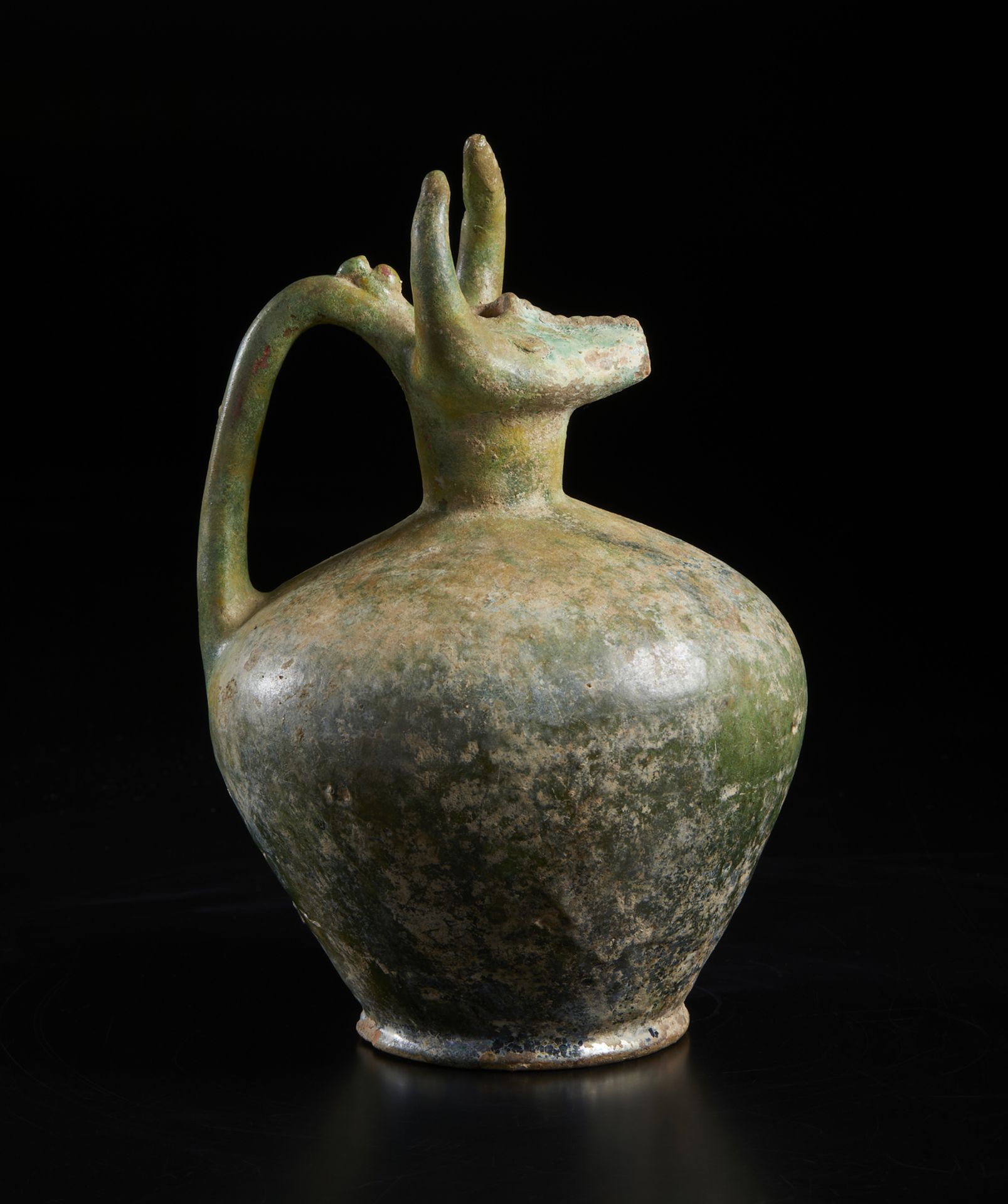 A bull (gav) headed green glazed pottery jug Iran, 12th century Of moulded fritware with a - Image 4 of 6