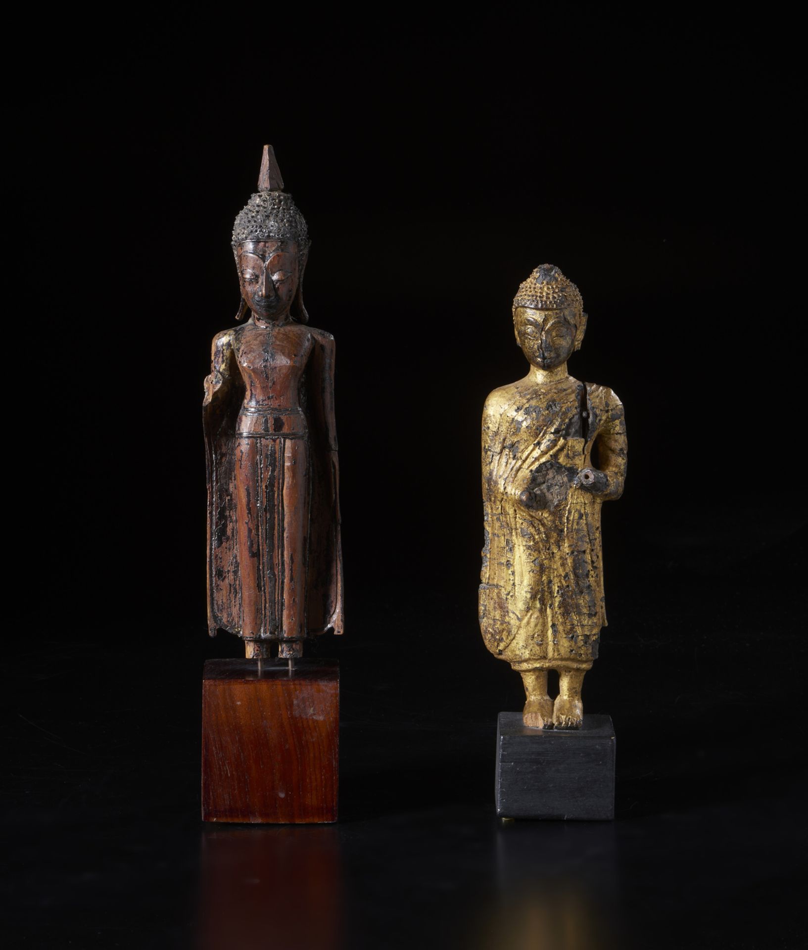 Two lacquered wooden sculptures depicting standing Buddha Burma, 18th-19th century Measurements: